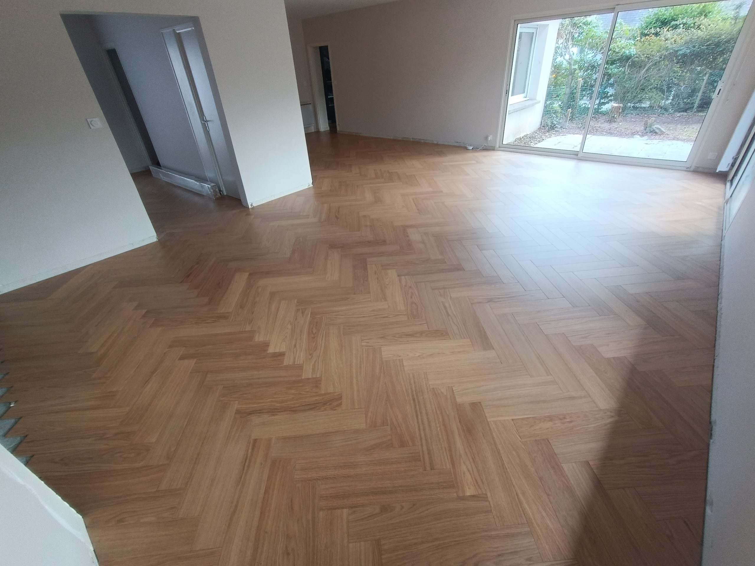 Réalisations menuisier poseur Les sens du Bois Pose de parquet flottant bâtons rompus La Trinité sur Mer