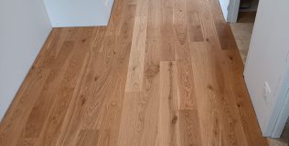 Réalisations menuisier poseur Les sens du Bois Pose collée de parquet chêne / Ile aux moines